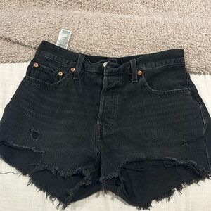 Levi’s 501 black distressed shorts